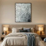 Gestural abstract expressionist hand-painted canvas in monochrome grays and blacks with dynamic linear marks, modern bedroom