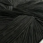 Textured abstract hand-painted canvas with radiating black linear brushstrokes and layered striations, monochromatic palette