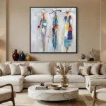 Gestural abstract hand-painted canvas depicting four stylized figures in vibrant multicolored brushstrokes and earth tones, contemporary living space