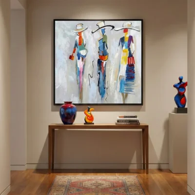 Contemporary figurative hand-painted canvas depicting three stylized women in vibrant blue, red, and yellow hues, modern entryway