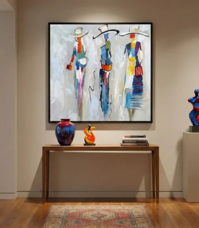 Contemporary figurative hand-painted canvas depicting three stylized women in vibrant blue, red, and yellow hues, modern entryway