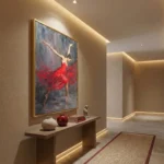 Figurative hand-painted canvas depicting a graceful ballerina in flowing red dress with dramatic gestural brushstrokes, muted grey and crimson palette, contemporary entryway