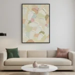 Layered abstract hand-painted canvas with gestural brushstrokes in cream, soft pink, sage green, and warm earth tones, contemporary living space
