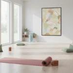 Layered abstract hand-painted canvas in soft pastels, cream and muted pink tones, yoga studio setting
