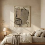 Gestural abstract hand-painted canvas with bold black line work and muted earth tones, contemporary bedroom