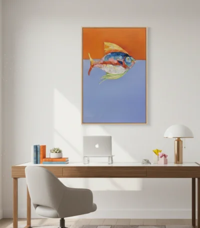 Figurative hand-painted canvas depicting a colorful fish with blue and red tones against divided orange and blue background, modern workspace
