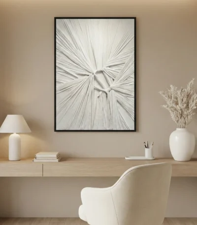 Gestural abstract hand-painted canvas with radiating linear brushstrokes in monochromatic grey and white tones, contemporary workspace