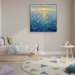 Textured impressionist hand-painted canvas depicting golden sunset over rippling ocean waves in blue and gold tones, styled in a contemporary nursery