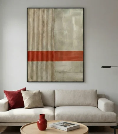 Minimalist abstract hand-painted canvas with geometric divisions, corrugated textures, and rust-red stripe on cream tones, contemporary living space