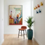 Contemporary figurative hand-painted canvas with bold geometric shapes, vibrant orange and teal palette, modern interior