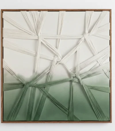 Abstract hand-painted canvas with woven natural fiber strands in cream and sage green gradients