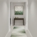 Minimalist abstract hand-painted canvas with layered green and cream brushstrokes suggesting botanical forms, hallway setting