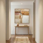 Textured abstract hand-painted canvas in layered terracotta, ochre and cream tones with gestural white dividing lines, modern entryway