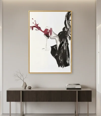 Contemporary figurative hand-painted canvas depicting woman with flowing dark hair and red wine splash in monochromatic palette, modern entryway