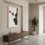 Gestural hand-painted canvas depicting a figure in deep burgundy and black ink strokes, contemporary minimalist interior