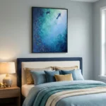 Layered abstract hand-painted canvas depicting a diver and sea turtle in luminous ocean blues and turquoise tones, modern bedroom