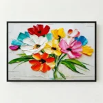 Textured contemporary hand-painted canvas of vibrant wildflowers in red, pink, yellow, and white with green stems, white wall backdrop