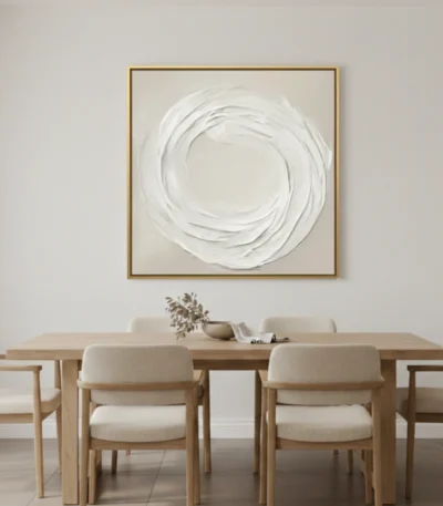 Minimalist abstract hand-painted canvas with gestural white circular brushstrokes on cream ground, contemporary dining space