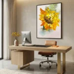 Sunflower Sculpt textured wall art shown framed on the wall in a styled interior