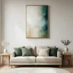 Layered abstract hand-painted canvas in soft greens, creams, and teal with gestural brushwork, contemporary living space
