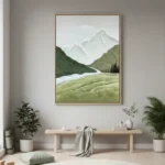 Textured landscape hand-painted canvas depicting snow-capped mountains, forested slopes, and alpine meadow in cool greens and whites, contemporary entryway