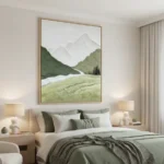 Contemporary landscape hand-painted canvas depicting snow-capped mountains, evergreen forest, and meadow in soft greens and whites, modern bedroom