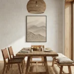 Minimalist landscape hand-painted canvas depicting layered mountains in soft sepia and cream tones, contemporary dining space