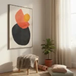 Contemporary abstract hand-painted canvas with bold geometric shapes in coral, black, and yellow tones, modern interior