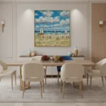 Impressionist hand-painted canvas depicting sailboats and beachgoers under blue sky with white clouds, warm sandy and ocean tones, dining space setting