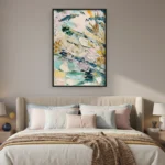 Gestural abstract hand-painted canvas with layered brushstrokes in soft pastels, teals, and golden yellows, modern bedroom