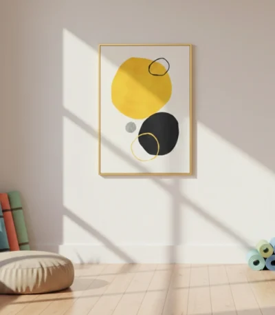 Minimalist hand-painted canvas with bold yellow and black circles, gold accents, neutral palette, contemporary studio space