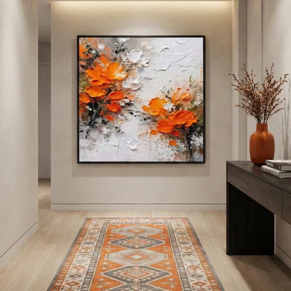 Textured abstract hand-painted canvas depicting orange and white flowers with gestural brushstrokes in warm tones, modern entryway