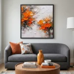 Textured abstract hand-painted canvas with vibrant orange flowers and gestural white brushstrokes, muted earth tones, contemporary living space