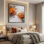 Textured abstract hand-painted canvas with vibrant orange flowers and gestural white brushstrokes, modern bedroom setting