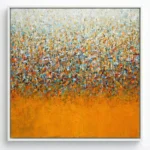 Textured abstract painting with gestural brushstrokes transitioning from soft cream and blue tones to vibrant orange and gold, hand-painted canvas in contemporary space