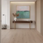 Contemporary landscape hand-painted canvas in soft pink and muted green tones, modern entryway