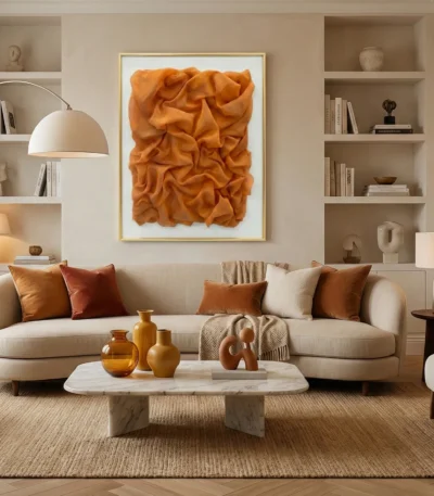 Textured abstract hand-painted canvas in rich burnt orange and cream, contemporary living space