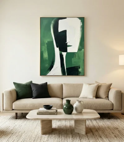 Contemporary abstract hand-painted canvas featuring geometric facial profile in green, black and cream tones, modern living space