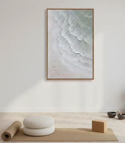 Minimalist abstract hand-painted canvas depicting layered ocean waves in soft whites and pale greens, styled in a zen meditation space