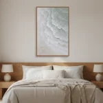 Minimalist abstract seascape painting in soft whites and grays depicting layered ocean waves, hand-painted canvas in modern bedroom