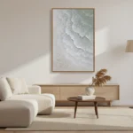 Minimalist abstract hand-painted canvas depicting layered ocean waves in soft whites and grays, contemporary living space