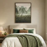 Contemporary landscape hand-painted canvas depicting misty mountains and windswept grasses in muted greens and earth tones, modern bedroom
