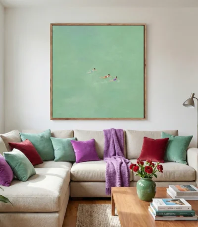 Minimalist figurative hand-painted canvas depicting swimmers in turquoise water, soft mint and seafoam palette, contemporary living space