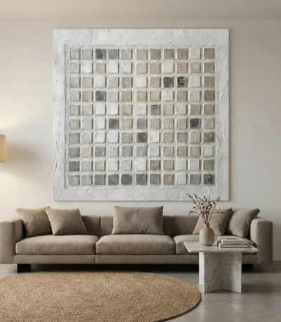Textured abstract hand-painted canvas in cream and taupe grid pattern, contemporary living space