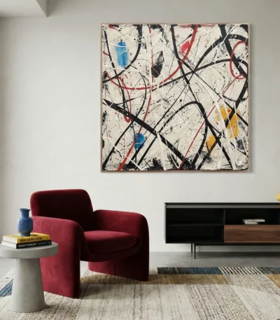 Gestural abstract expressionist hand-painted canvas with energetic black, red, and blue brushstrokes on cream, contemporary living space