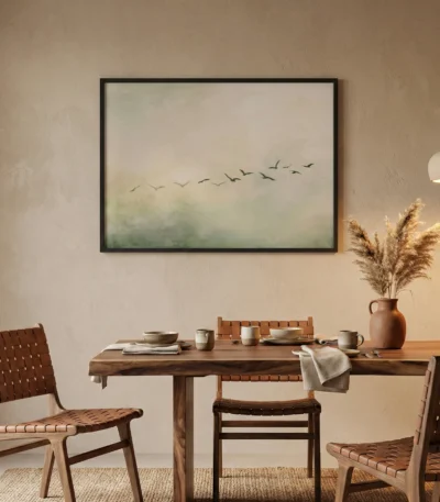 Minimalist landscape hand-painted canvas depicting migrating birds in muted greens and soft neutrals, contemporary dining space