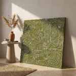 Verdant Labyrinth textured wall art shown framed on the wall in a styled interior