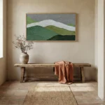 Minimalist landscape hand-painted canvas in layered greens and white, depicting rolling hills in contemporary entryway