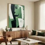 Gestural abstract hand-painted canvas in emerald green, black and cream with dynamic brushwork, contemporary living space