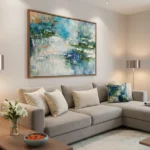 Layered abstract hand-painted canvas in soft blues, greens, and creams with gestural brushwork, contemporary living space